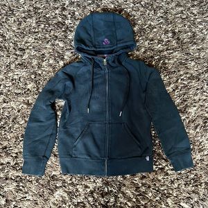 TNA black hoodie with purple symbol